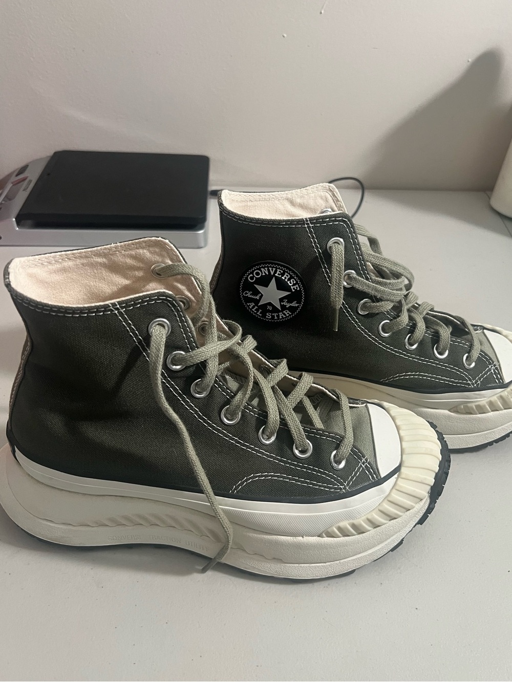 Converse High Top Canvas Sneakers in Olive